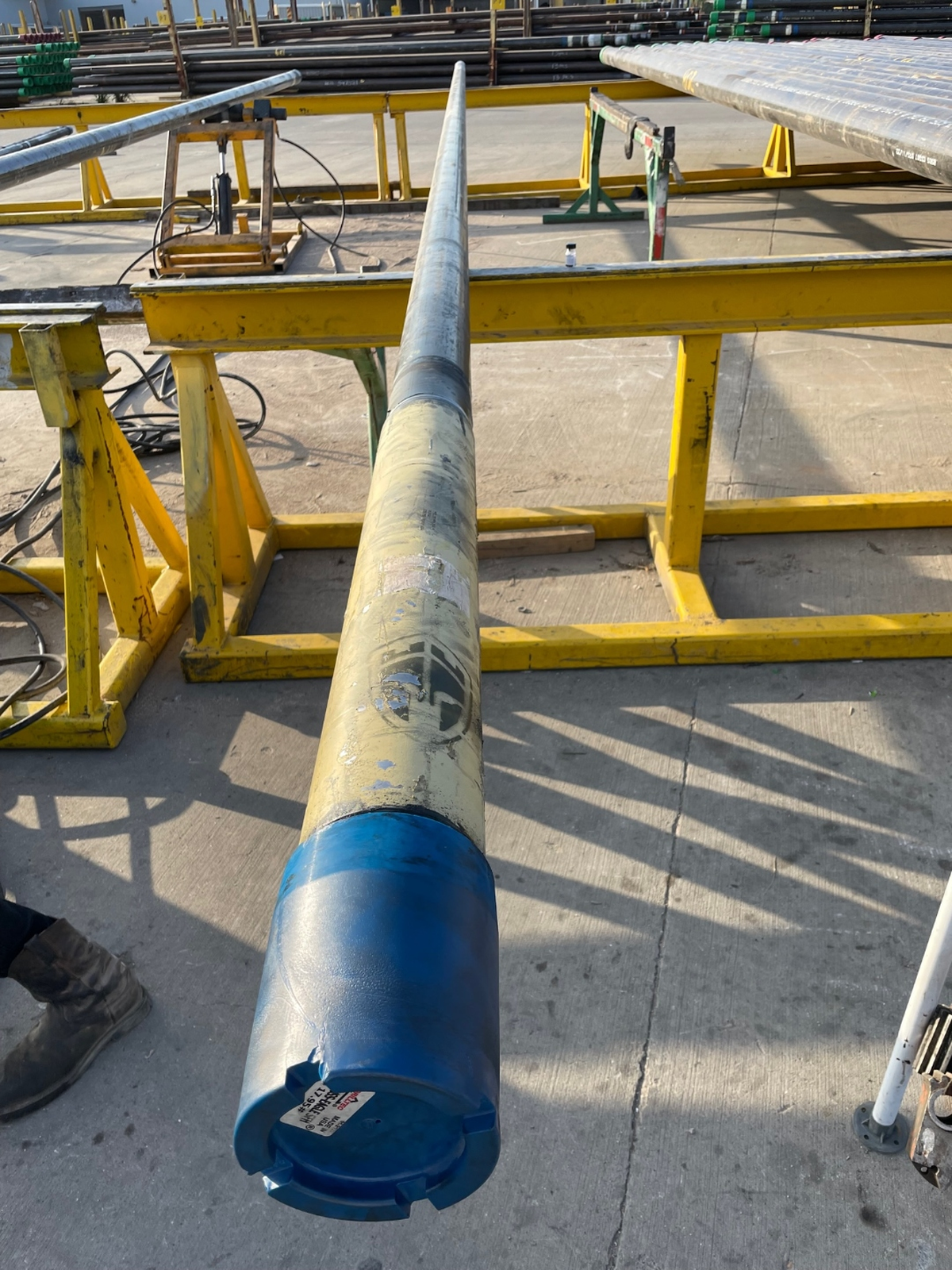 Hydraulic bucking machine on a Delta Solutions staging yard