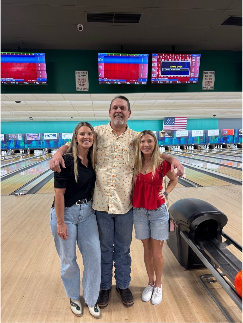 Delta Solutions team members at a community bowling event